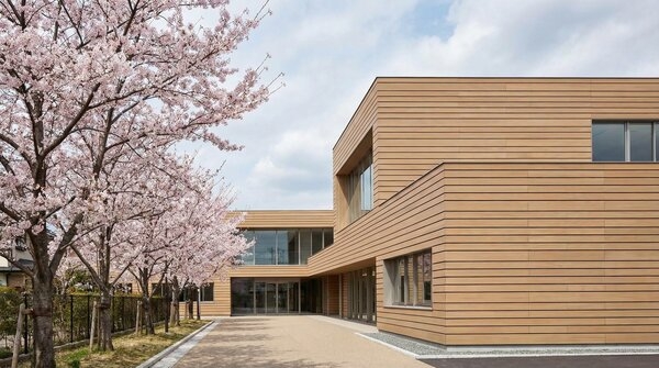 Facade finished with recycled wood plastic composite cladding boards