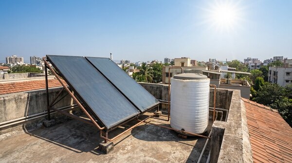 Roof-mounted solar collectors with hot water tank