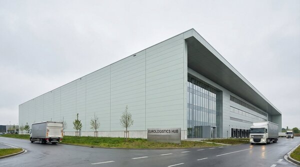 Industrial roof clad with light grey PIR-core sandwich roof panels